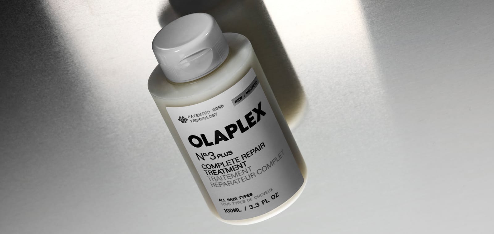 צילום קמפיין מקורי של OLAPLEX — No.3 PLUS · Complete Repair Treatment